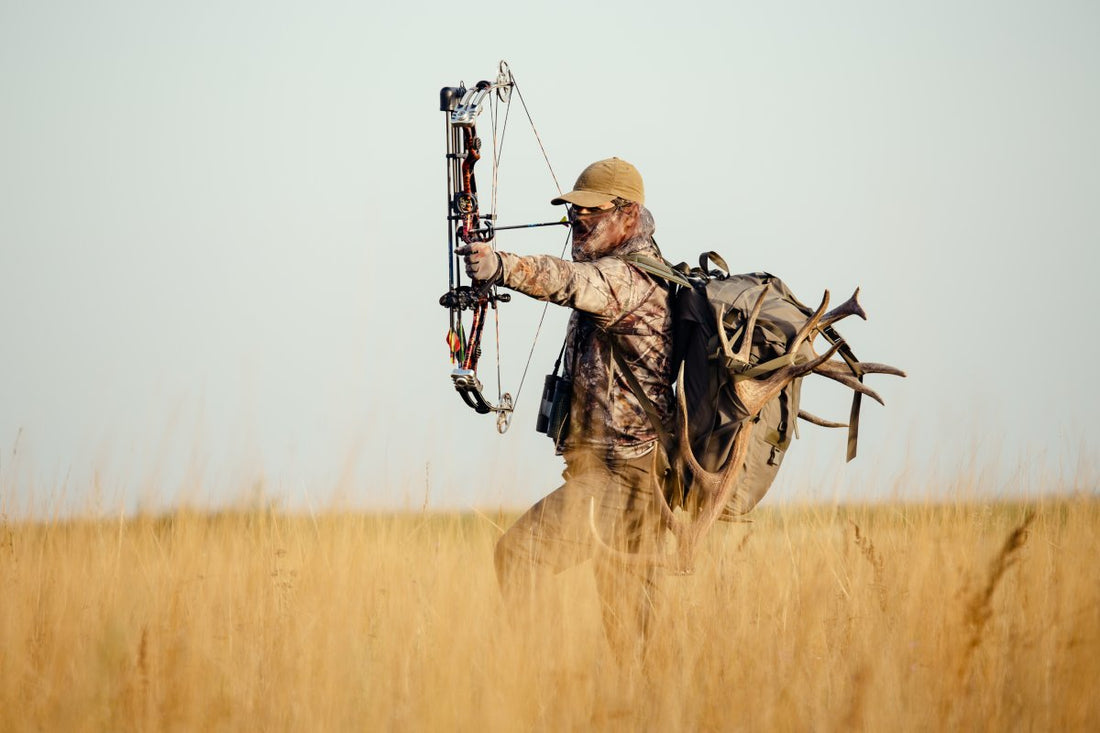 A hunter with a compound bow